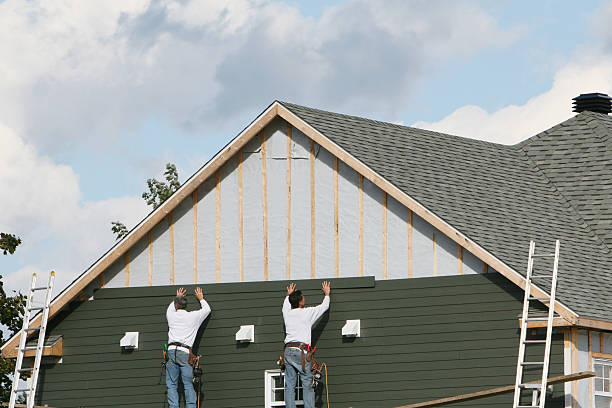 Professional Siding Repair technician working in Bellevue, OH